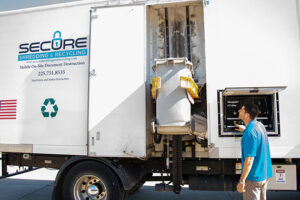 Secure Shredding & Recycling professional performing mobile shredding service.