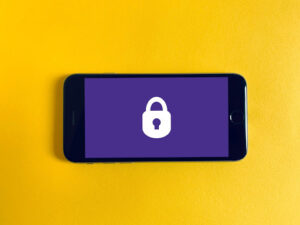 a phone with a purple screen and padlock symbol