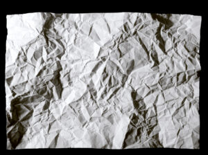 Crumpled paper to put in secure document containers