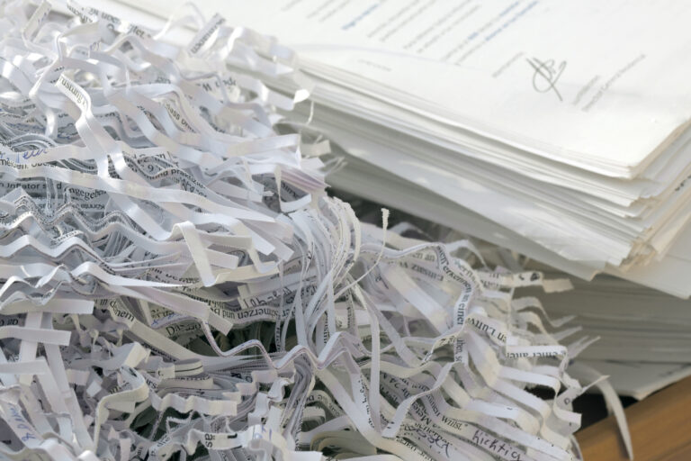 On-site mobile shredding service securely destroying confidential office documents – Secure Shredding and E-Recycling
